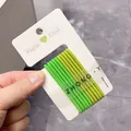 Set of 10 gradient green high elasticity hair ties on a white paper hangtag - Green Series