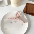 Elegante pinza de pelo rosa mate con diseño de cruz minimalista en resina para mujer - Rosa Claro