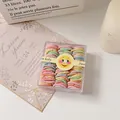 Set of pastel macaron color spiral hair ties in transparent storage box - Screw Back / Ribbed Light Colors