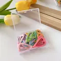 Polka dot macaron BB hair clips in heart and triangle shapes inside a transparent box - Heart Style