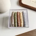 Set of 5 pleated satin hair scrunchies in earthy tones with a clear storage box - Colorful