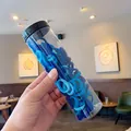 Jar of high-elastic blue seamless hair ties for girls in various ocean blue shades - Blue