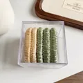 Five-pack of pleated satin hair scrunchies in champagne and sage green within a square box - Beige Yellow Green