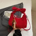 Red bow handbag with suede splicing, wooden bead charm and crossbody leather strap - With Pendant / Red