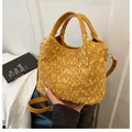 Yellow fluffy plush bucket bag with brown leather handles and adjustable shoulder strap - With Pendant Style / Yellow