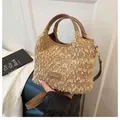 Plush khaki faux shearling bucket bag with brown leather handles and a shoulder strap - With Pendant Style / Brown