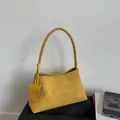 Minimalist ginger yellow matte suede underarm bag with a matching shield pendant charm - With Small Pouch / Yellow