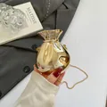 Elegante borsa da sera dorata a forma di caramella con finitura a specchio e catena - Oro chiaro