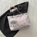 Pink floral print bucket tote bag with metal chain strap and cloud charm detail - With Pendant / Pink