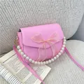 Sac à bandoulière rose en cuir PU avec nœud en organza et poignée en perles - Rose