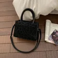 Black leopard print suede square handbag with round handle and gold hardware detail - No Pendant / Black
