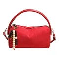 Red suede cylindrical underarm bag with decorative wooden beads and silver hardware - With Charm / Red