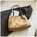 Detail of laser-cut flower pattern on beige suede tote bag with brown straps - Khaki (No Pendant)