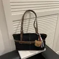 Retro black canvas shoulder bag with brown leather trim and cute plush bear charm - With Pendant / Black