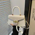 Chic cream white crossbody bag with gold M-letter buckle and woven texture detail - White