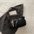 Vintage black faux suede tote bag with wooden bead tassel and leather strap detail - With Pendant / Black