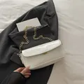 Chic cream white glossy patent leather baguette bag with elegant gold chain strap - White