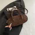 Brown leopard print suede baguette bag with dual handles and silver-tone hardware - Brown No Pendant