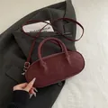 Minimalist wine red baguette handbag with top handles and adjustable shoulder strap - Red (No Pendant)
