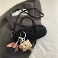 Minimalist black leopard print baguette bag with plush cartoon charm and adjustable strap - Black With Pendant