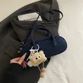 Dark blue suede baguette bag with leopard print and cute brown plush monster charm - Blue with Pendant