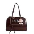 Vintage large dark brown glossy tote bag with dog charm and ribbon on white background - Brown with Pendant