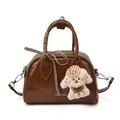 Brown vintage pillow bag with crossbody strap, plaid ribbon, and puppy charm - With Pendant / Tan