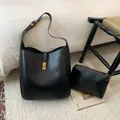 Minimalist black leather bucket bag set with matching pouch and matte gold hardware - Small / Main Bag With Inner Pouch / Black