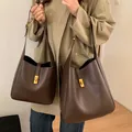 Deep brown soft leather bucket bags in two sizes with gold metal lock closure - Small / Main Bag With Inner Pouch / Brown