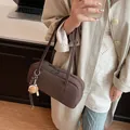 Dark brown matte suede baguette bag with creative baseball glove charm decoration - With Pendant / Coffee
