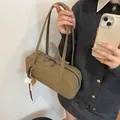 Olive green suede baguette shoulder bag with a unique baseball charm for daily casual wear - With Pendant / Khaki
