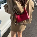 Fashionable bright red woven shoulder bag for women with colorful beaded tassel detail - With Pendant / Red