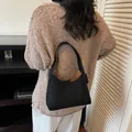 Chic black faux suede hobo bag for women with gold chain strap and vintage design - Black