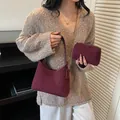 Two-piece burgundy suede shoulder bag set with gold chain and matching small pouch - Burgundy