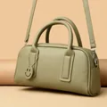 Bean paste green Boston bag with litchi grain leather and adjustable crossbody strap - Green