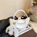 White lychee leather bucket bag with a plush rabbit pendant and a crossbody strap - Basic Style (No Pendant) / White