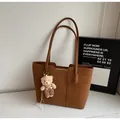 Vintage brown suede tote bag with long shoulder straps and a cute plush bear charm decoration - Without Pendant / Brown