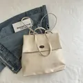 Vintage style cream PU leather backpack with gold clasp and minimalist shoulder straps - Rice White (No Pendant)