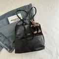 Retro black faux leather tote bag with vintage texture and cute rabbit plush charm - Black With Pendant