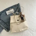 Cream white vintage PU leather tote backpack with flap closure and cute rabbit charm - Cream White with Pendant