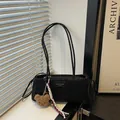 Black leopard print underarm tote bag with oil wax leather texture and bear charm - With Pendant / Black