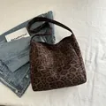 Deep brown leopard print tote bag with thick canvas fabric and wide shoulder strap - Brown