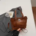 Vintage braune Bucket Bag aus PU-Leder mit Zierschnalle und abnehmbarem Gurt - Braun