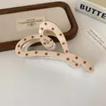 Cream heart-shaped hair claw clip with red floral patterns and metal spring detail - Cream Floral