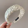 Beige woven sponge headband with silver sequins and gold metallic thread finish - Off White