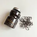 Jar of high elasticity black disposable hair ties with durable non-damaging stretch - Dark Coffee Jar Pack
