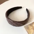 Padded PU leather headband in dark brown featuring a classic quilted lattice pattern - Dark Coffee