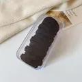 Set of high-elastic black hair ties for girls stored in a clear rectangular plastic box - Black Jar Pack