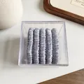 Set of five silver grey satin scrunchies in a clear box with a soft pleated texture - Light Blue