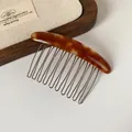 Handmade amber tortoiseshell hair comb with 12-tooth metal teeth for French hairstyles - Red Brown Oval Hair Comb